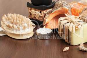 spa accessories on brown wooden background