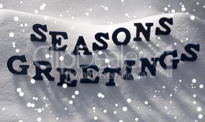 Blue Word Seasons Greetings On Snow, Snowflakes