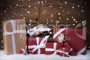 Red Christmas Gifts And Presents With White Ribbon, Snowflakes