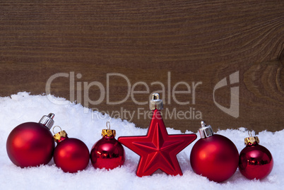 Wooden Christmas Background On Snow, Red Balls And One Star