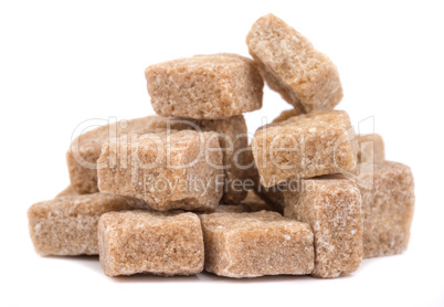 cubes of sugar cane brown isolated on white background