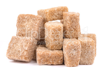 cubes of sugar cane brown isolated on white background