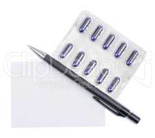 Ballpoint pen with blank sheet for notes and capsules in blister packs