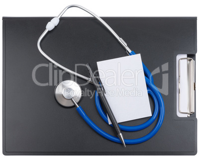 Clip board with stethoscope and white sheet of paper