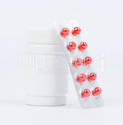 Bottles of medicines and pills in a blister pack