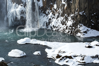 Closeup of frozen waterfall Godafoss, Iceland