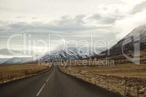 Road in volcanic mountain landscape in Iceland