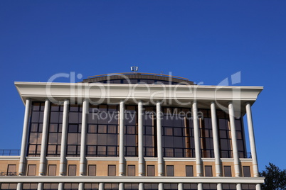 facade of office building  on sky background