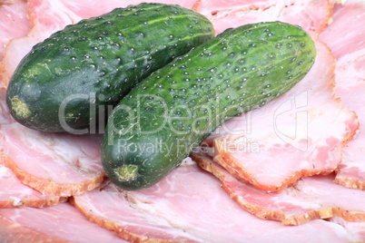 two cucumber on ham meat