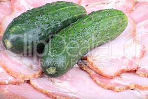 two cucumber on ham meat