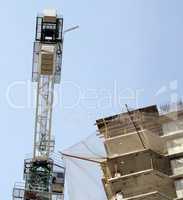 house develop with crane at day