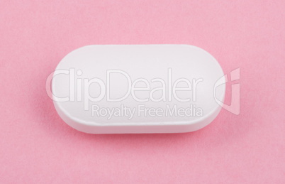 White Pill on Pink Background