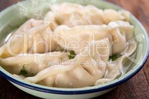 Close up fresh dumplings soup