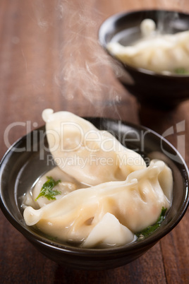 Asian appetizer dumplings soup