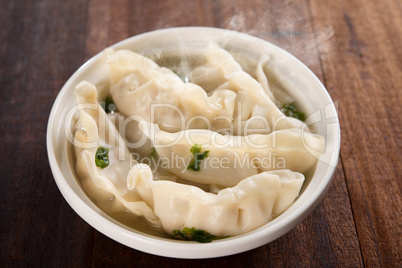 Delicious Asian dish dumplings soup