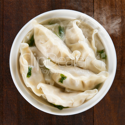 Top view Asian dish dumplings soup