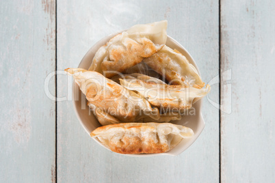 Top view Asian gourmet pan fried dumplings