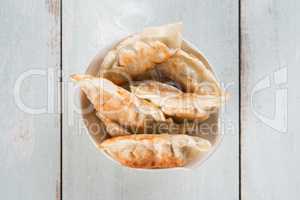 Top view Asian gourmet pan fried dumplings