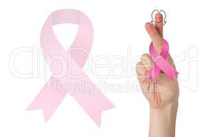 Composite image of crossed fingers with breast cancer ribbon