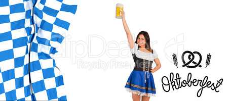 Composite image of pretty oktoberfest girl raising beer tankard