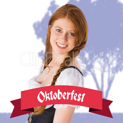 Composite image of oktoberfest girl smiling at camera