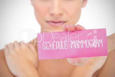 Schedule mammogram against white background with vignette