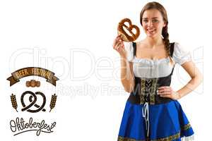 Composite image of pretty oktoberfest girl holding pretzel