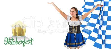 Composite image of pretty oktoberfest girl smiling with arms rai