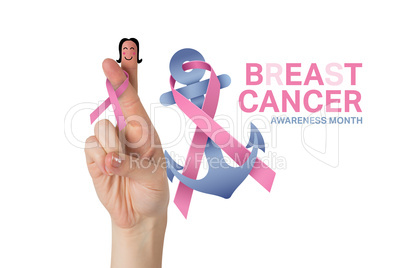 Composite image of crossed fingers with breast cancer ribbon