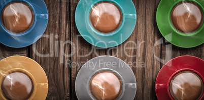 Overhead view of various colorful tea cups