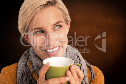 Composite image of close up of woman drinking from a cup