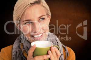 Composite image of close up of woman drinking from a cup