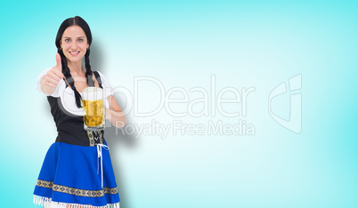 Composite image of pretty oktoberfest girl holding beer tankard