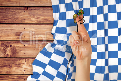 Composite image of oktoberfest character fingers