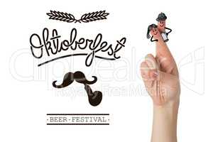 Composite image of oktoberfest character fingers