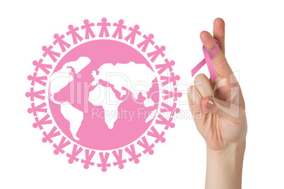 Composite image of crossed fingers with breast cancer ribbon