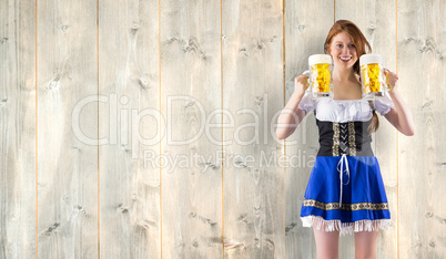 Composite image of oktoberfest girl holding jugs of beer