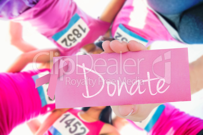 Donate against five smiling runners supporting breast cancer mar
