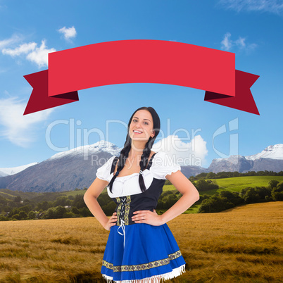 Composite image of pretty oktoberfest girl smiling at camera