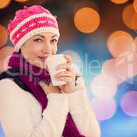 Composite image of woman holding coffee cup