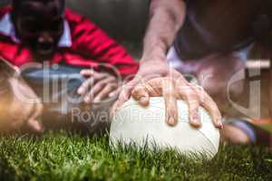 Composite image of rugby fans in arena