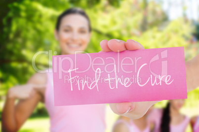 Find the cure against smiling women in pink for breast cancer aw