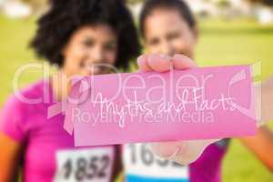 Myths and facts against two smiling runners supporting breast ca