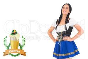 Composite image of pretty oktoberfest girl smiling at camera