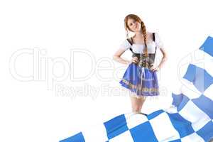 Composite image of oktoberfest girl looking at camera