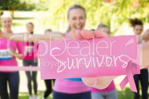 Survivors against smiling women running for breast cancer awaren