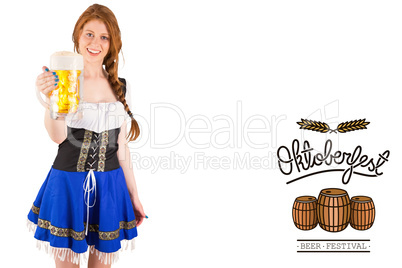 Composite image of oktoberfest girl smiling at camera holding be