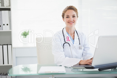 Composite image of pink breast cancer awareness ribbon