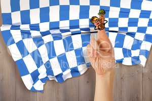 Composite image of oktoberfest character fingers