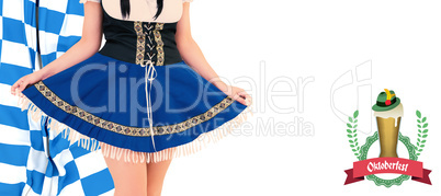 Composite image of oktoberfest girl spreading her skirt